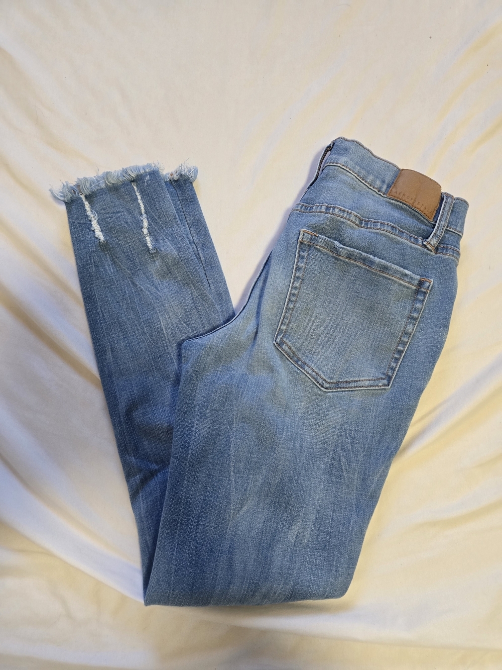 Aeropostale Skinny Jeans Womens Size 0 Light Wash Distressed Raw Hem Stretch